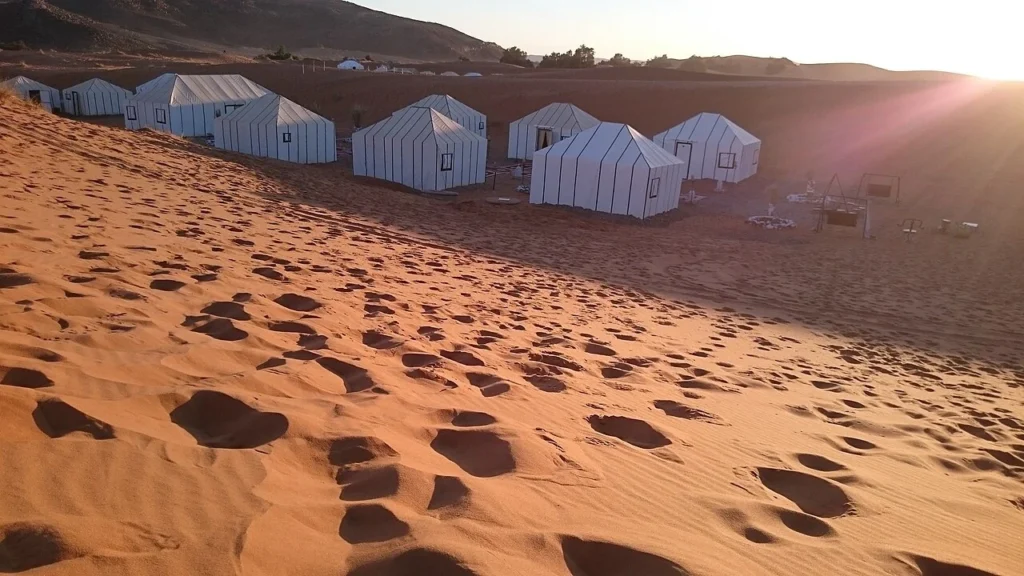 Desert camp among the dunes near Merzouga